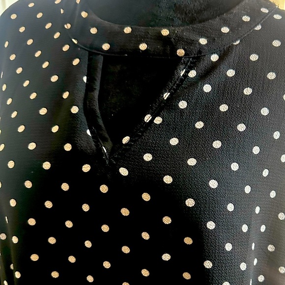 Brand: NAIF, black dress, with white dots, and flared sleeves - Picture 4 of 12